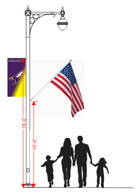 A family walks together under a street light